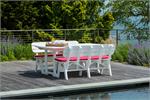 Table with 2  benches in white on pool deck