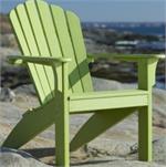 This is a leaf green adirondack chair shown by itself with the ocean behind it