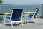 two chairs by the water, white and navy